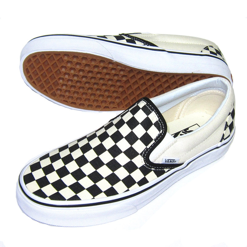 Vans classic slip cheap on black and white