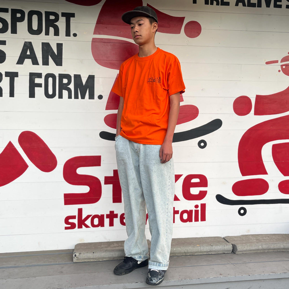 STOKE x KENJI '373' GOTO SKATE TOURISM TEE ORANGE